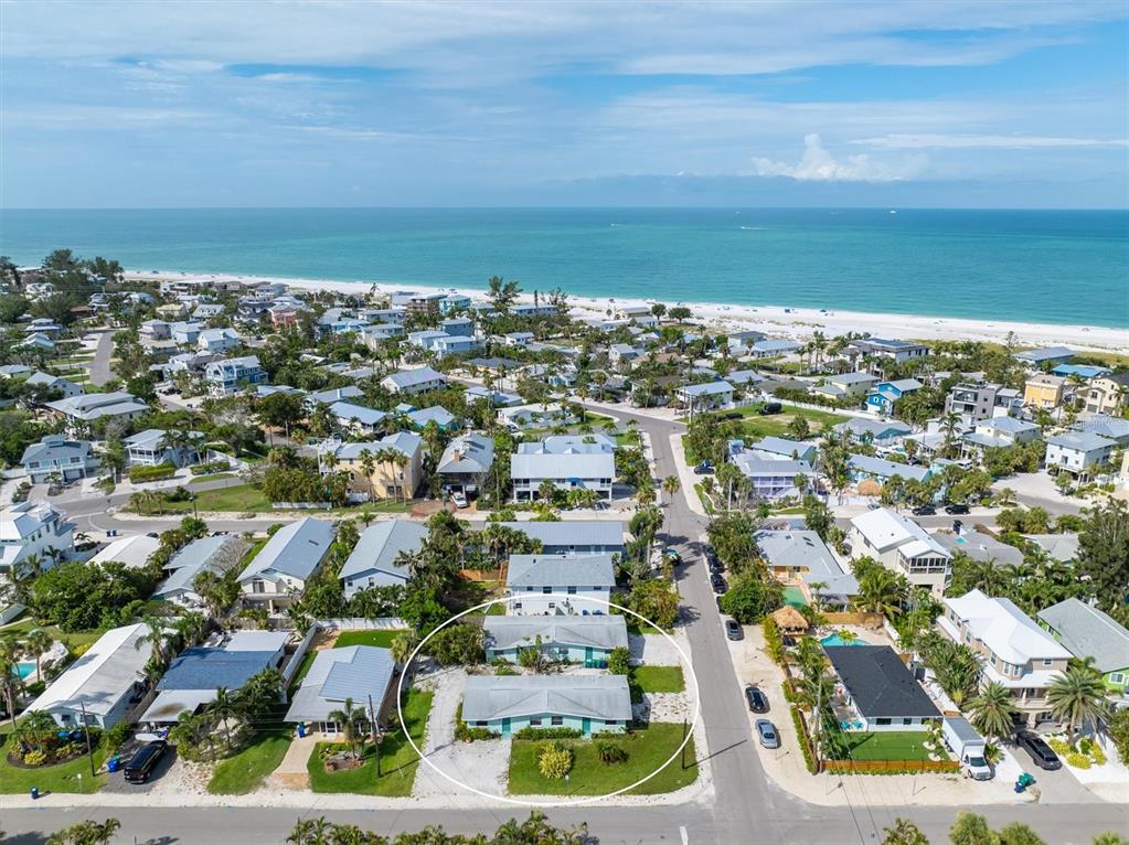 411 Alamanda Road Anna Maria, FL 34216 - Photo 39 of 41 an aerial view of residential building and ocean