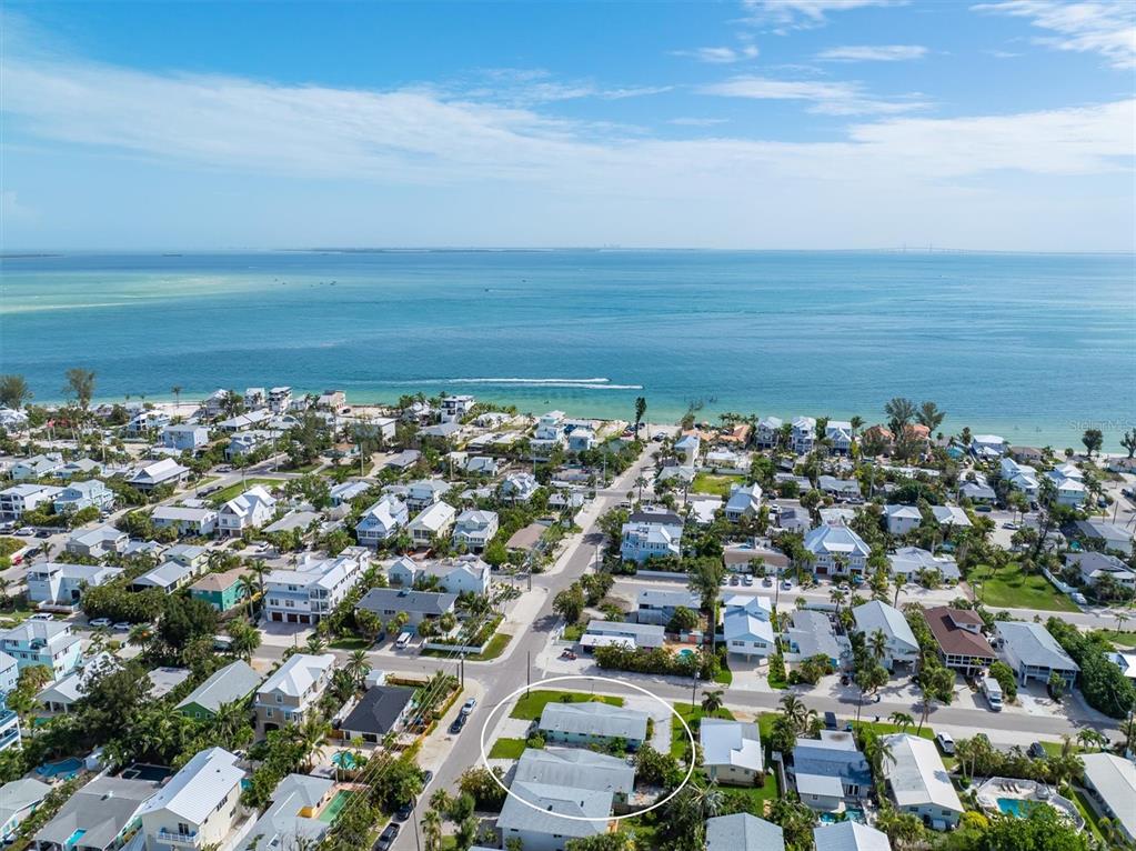 411 Alamanda Road Anna Maria, FL 34216 - Photo 41 of 41 an aerial view of a city with ocean view in back