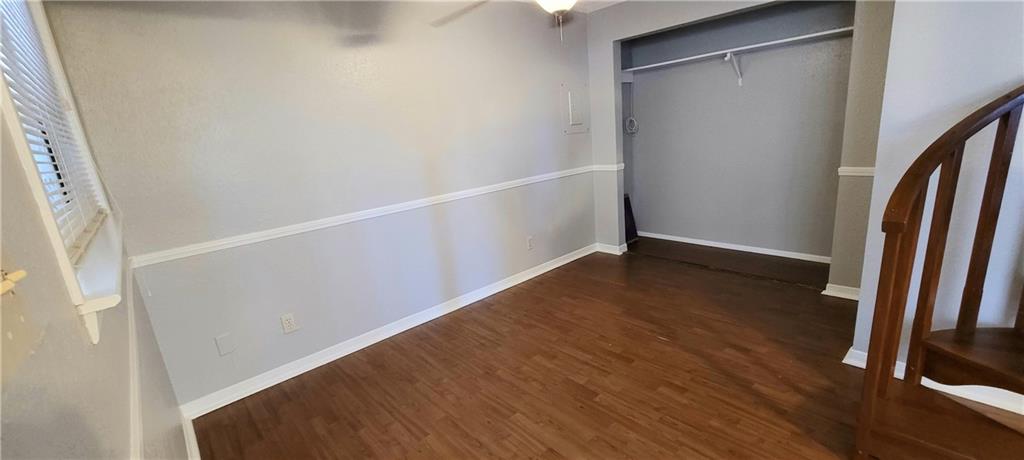 2500 Burleson Road, Unit 611 Austin, TX 78741 - Photo 8 of 22 a view of hallway with wooden floor
