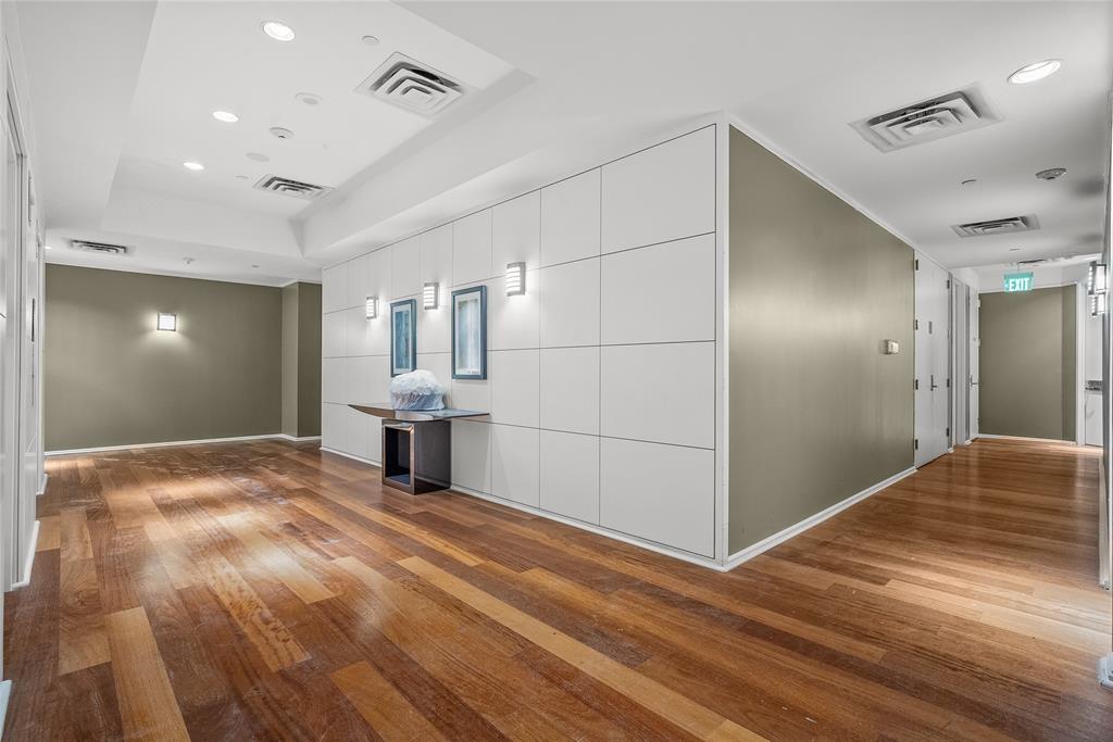 3111 Welborn Street, Unit 1701 Dallas, TX 75219 - Photo 15 of 33 a view of a livingroom with a staircase