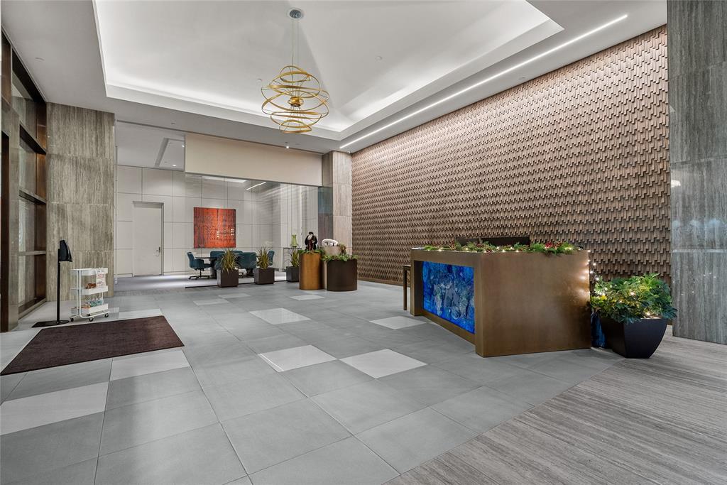 3111 Welborn Street, Unit 1701 Dallas, TX 75219 - Photo 18 of 33 a lobby with furniture and potted plants