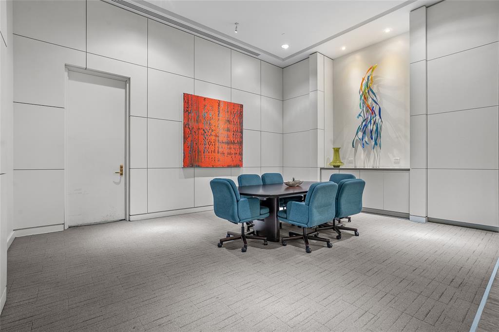 3111 Welborn Street, Unit 1701 Dallas, TX 75219 - Photo 21 of 33 a view of a workspace with furniture and a window