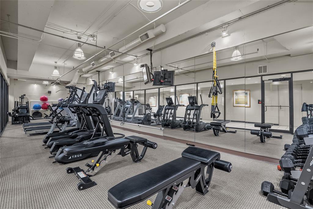 3111 Welborn Street, Unit 1701 Dallas, TX 75219 - Photo 23 of 33 a view of a room with gym equipment