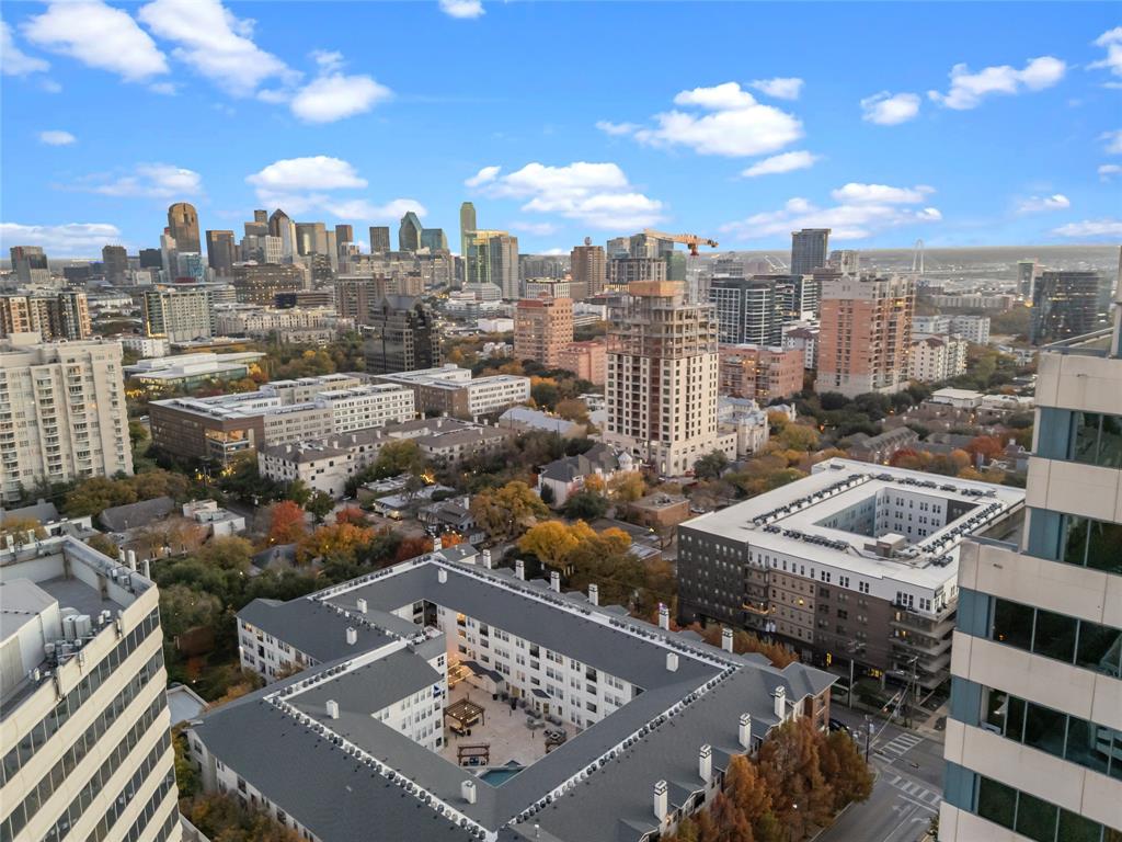 3111 Welborn Street, Unit 1701 Dallas, TX 75219 - Photo 30 of 33 a view of a city with tall buildings