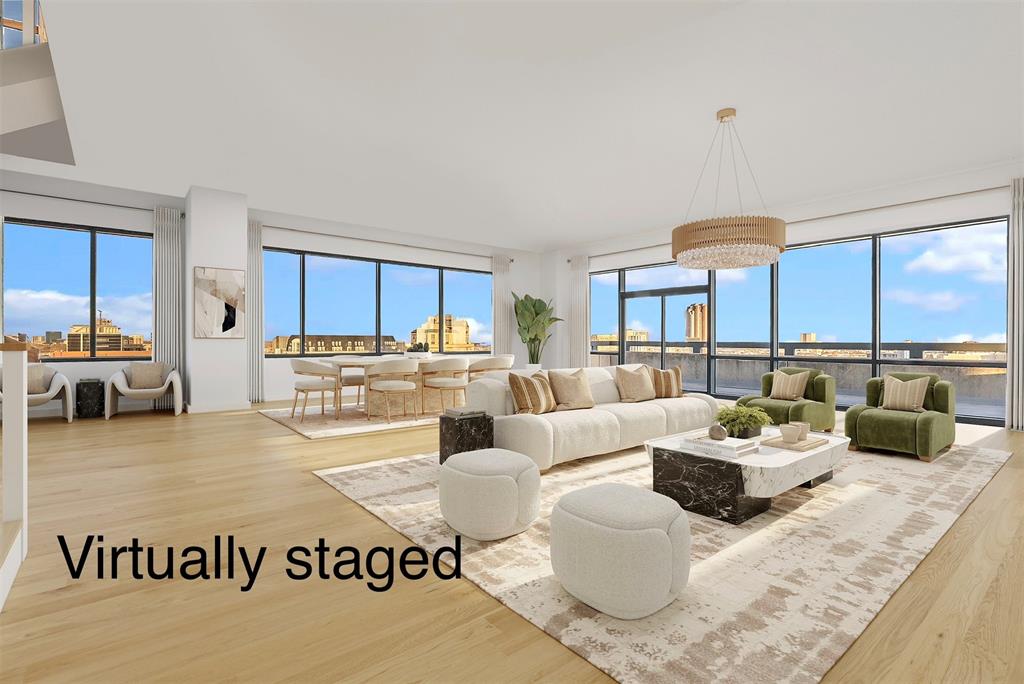 3111 Welborn Street, Unit 1701 Dallas, TX 75219 - Photo 3 of 33 a living room with furniture and a large window