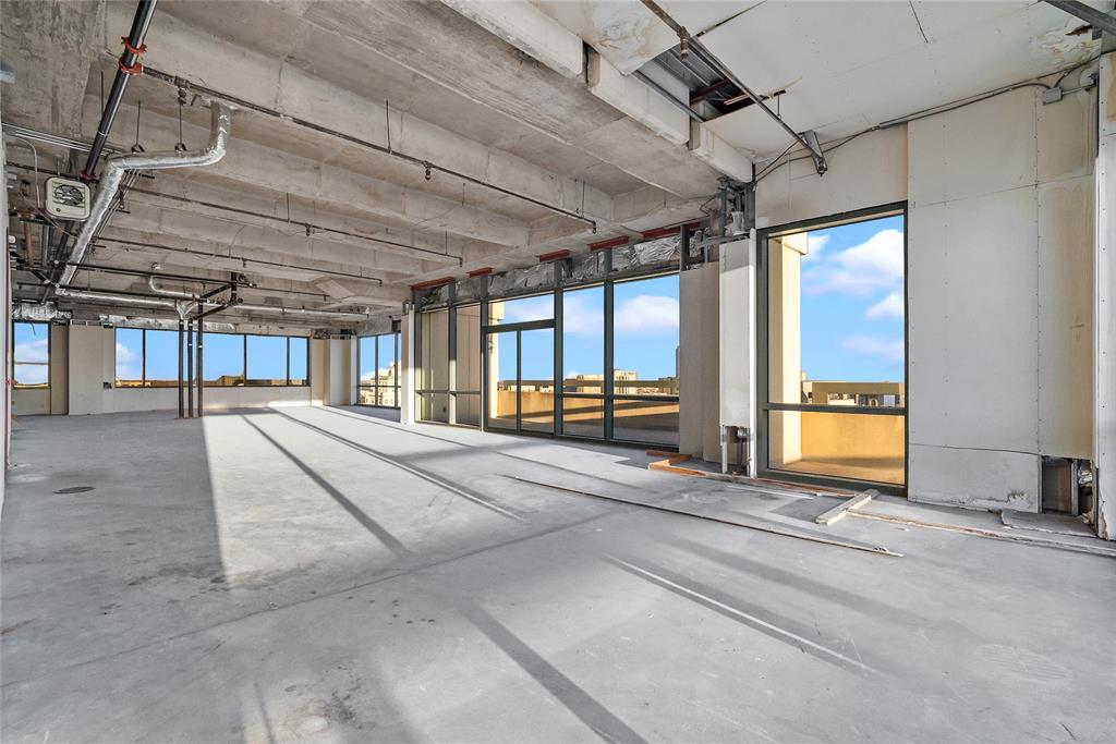 3111 Welborn Street, Unit 1701 Dallas, TX 75219 - Photo 6 of 33 a view of a room with a couch