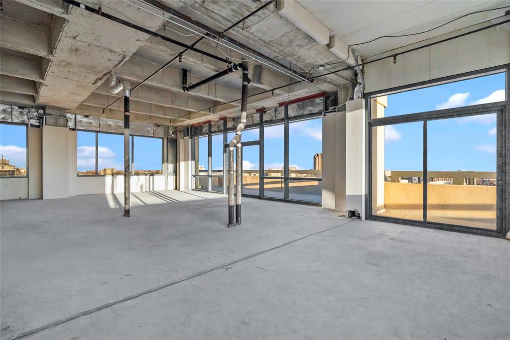 3111 Welborn Street, Unit 1701 Dallas, TX 75219 - Photo 7 of 33 a view of a room with wooden walls
