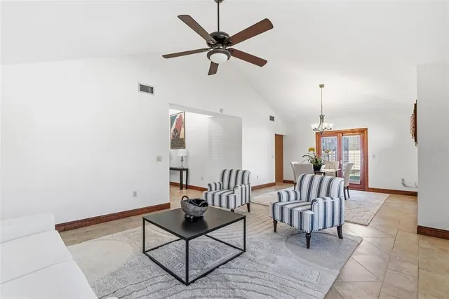 a large kitchen with stainless steel appliances granite countertop a granite counter tops and a large window