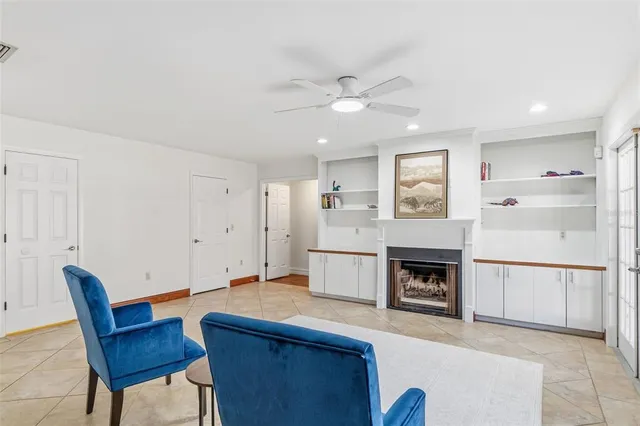 a bathroom with a toilet a sink and a mirror