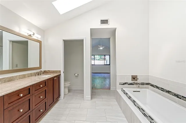 a view of swimming pool with a yard