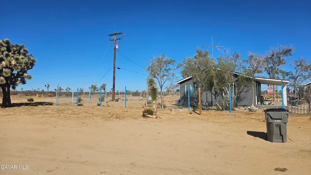 a row of houses with yard