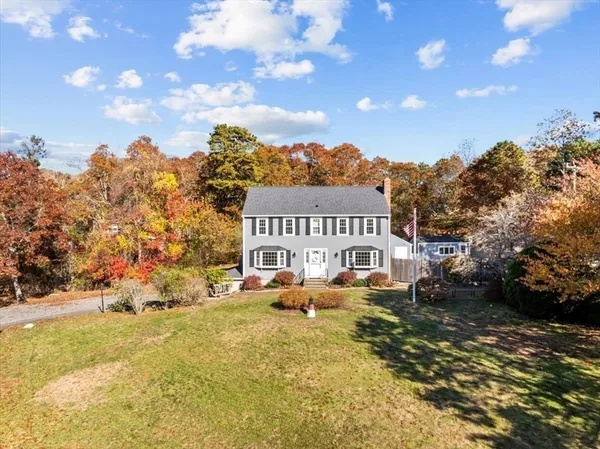 a view of a house with a big yard