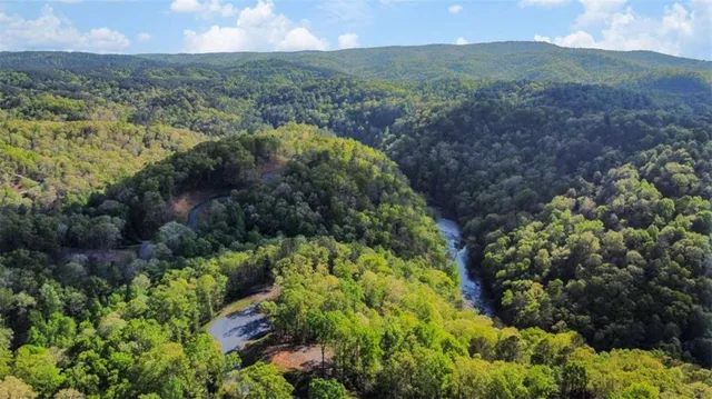 a view of a yard with mountains
