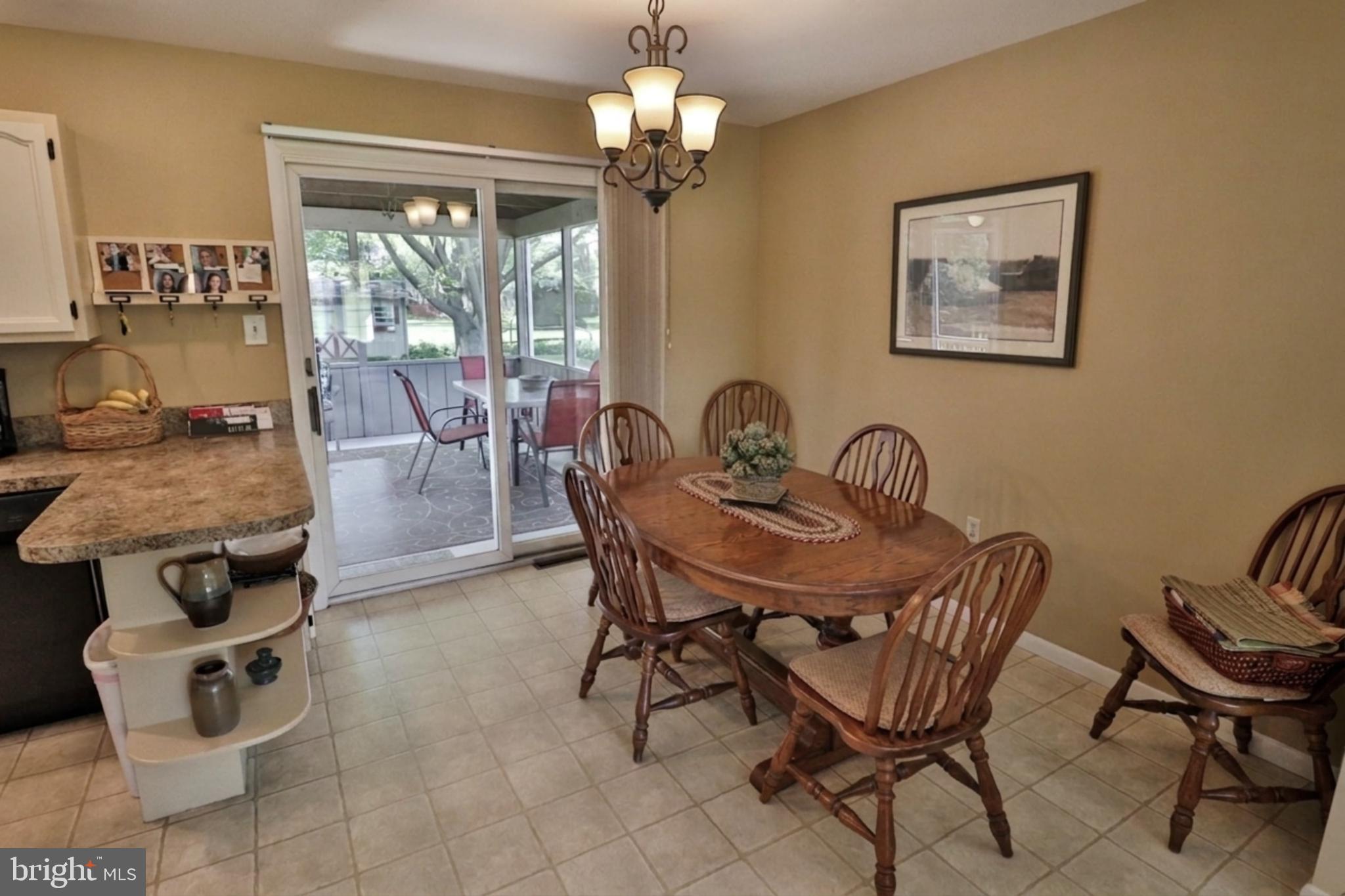 34 South Oak Street Lititz, PA 17543 - Photo 21 of 43 a view of a dining room with furniture and a chandelier