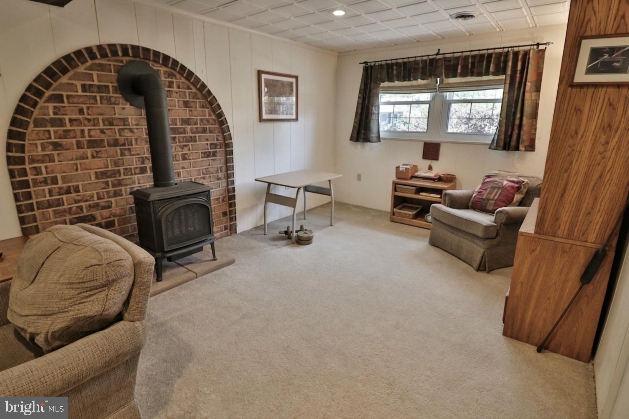 34 South Oak Street Lititz, PA 17543 - Photo 25 of 43 a living room with furniture and a fireplace