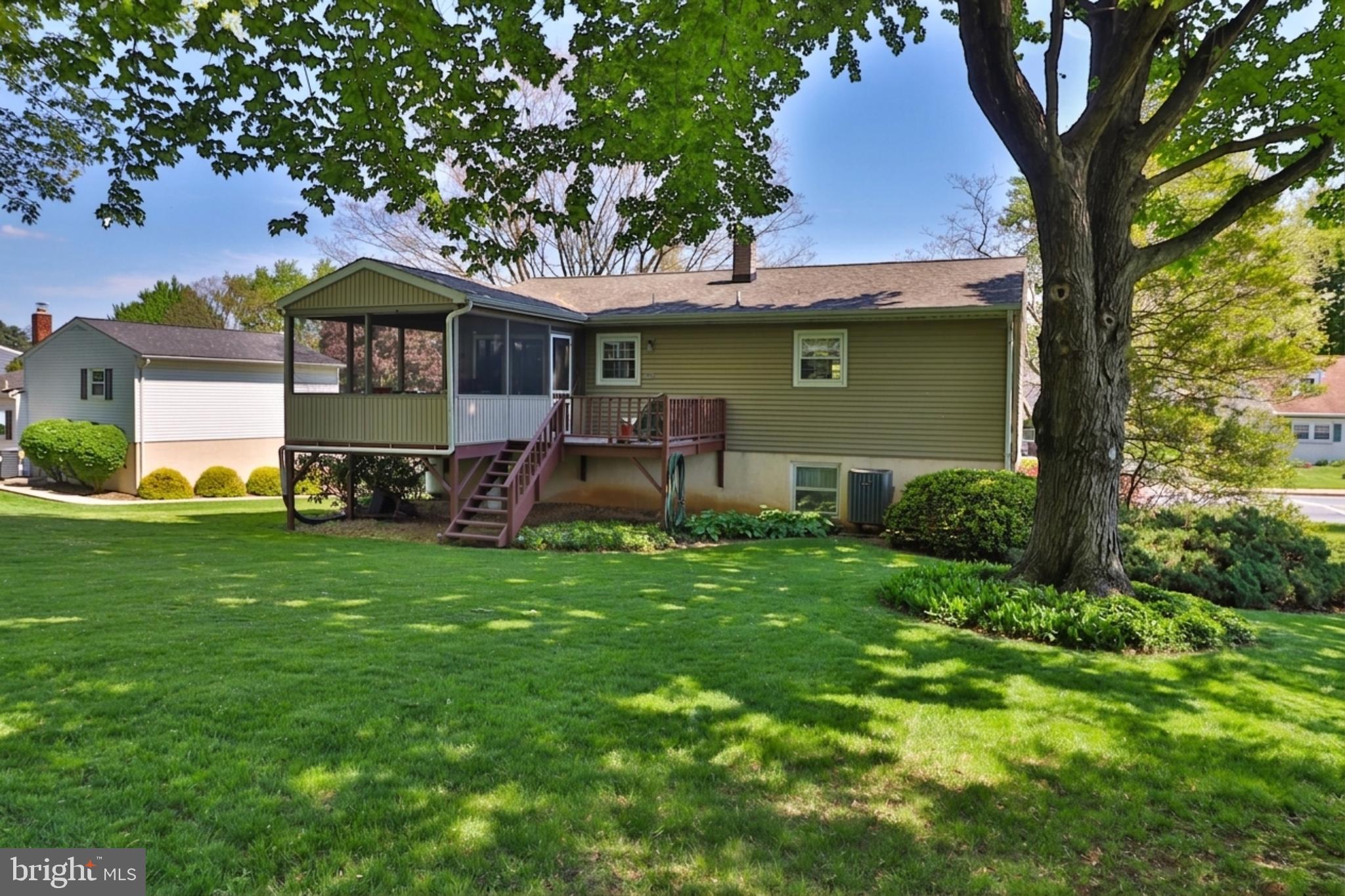 34 South Oak Street Lititz, PA 17543 - Photo 3 of 43 a front view of a house with a garden and tree