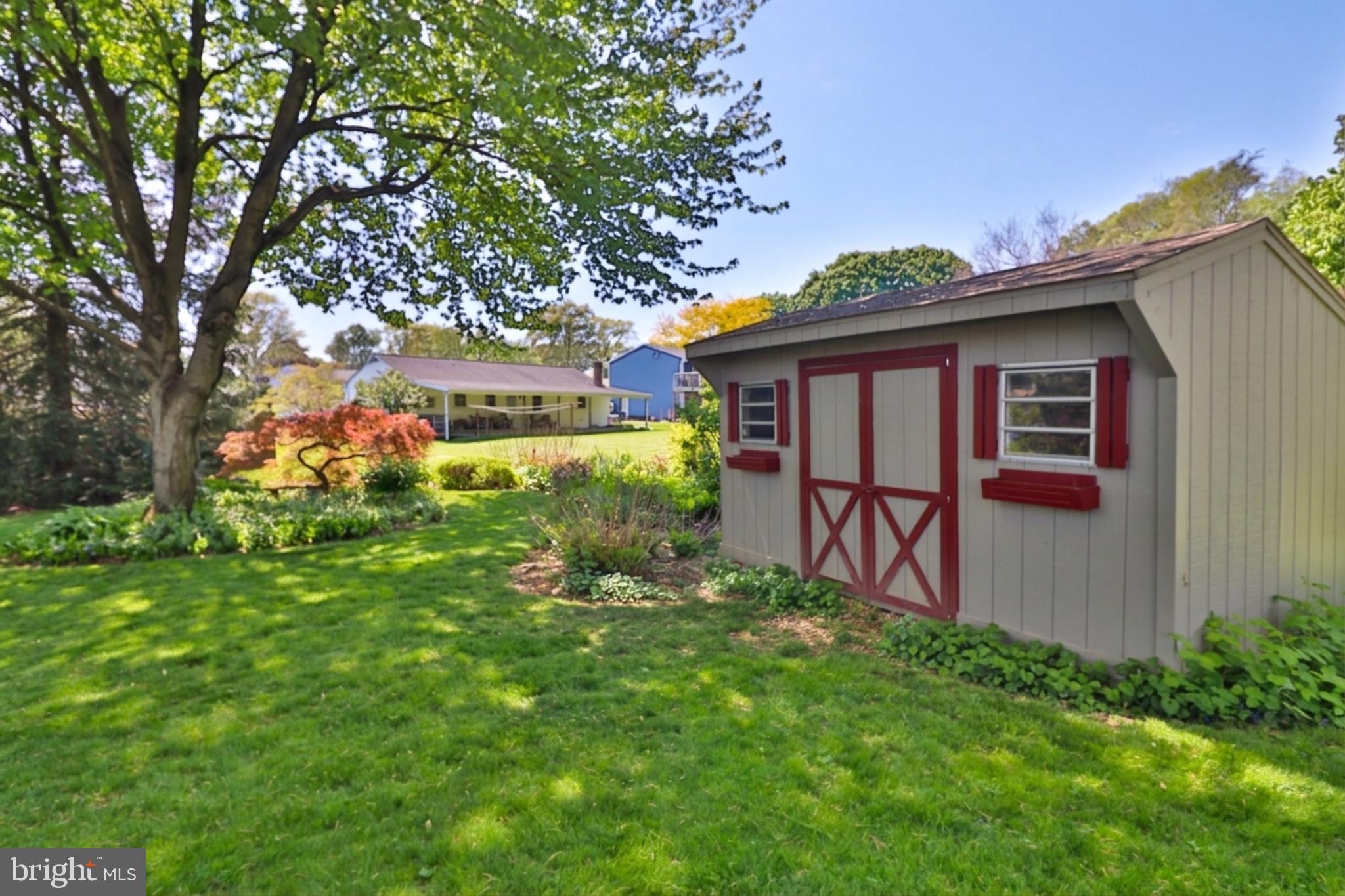34 South Oak Street Lititz, PA 17543 - Photo 39 of 43 a house with green field in front of it