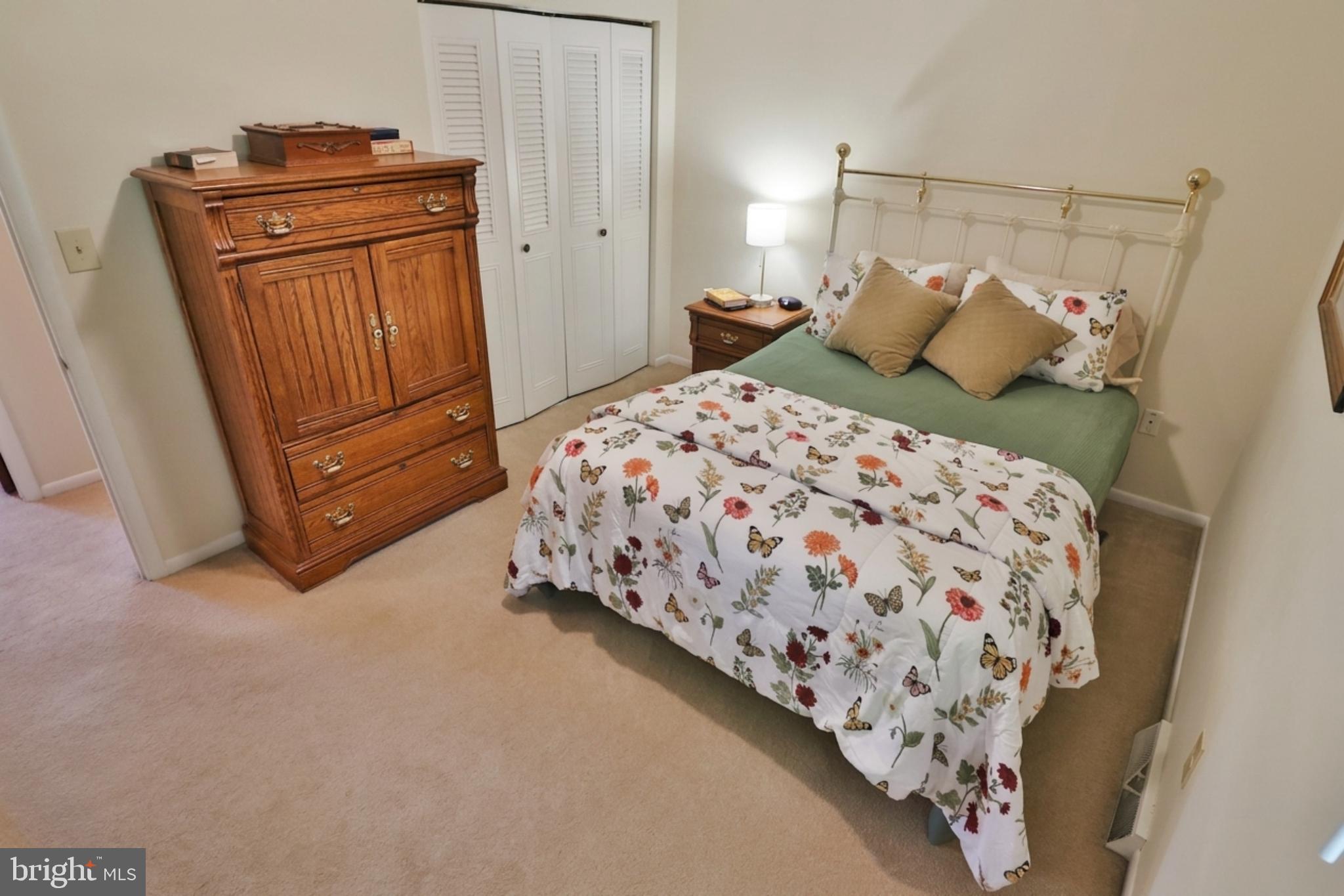 34 South Oak Street Lititz, PA 17543 - Photo 8 of 43 a bedroom with a bed and wooden floor