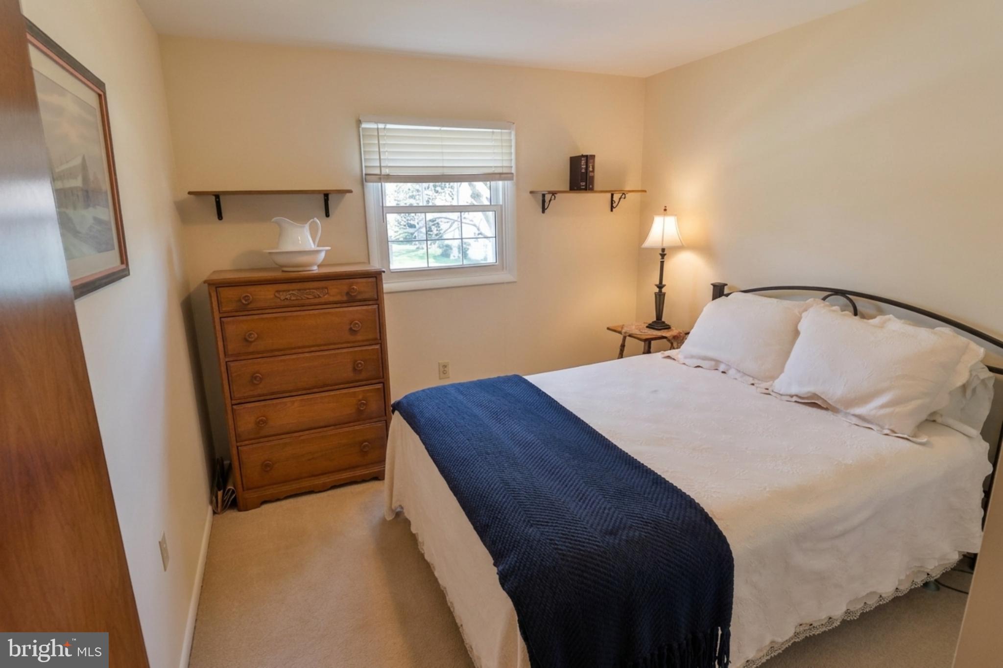 34 South Oak Street Lititz, PA 17543 - Photo 9 of 43 a bedroom with a bed and a window