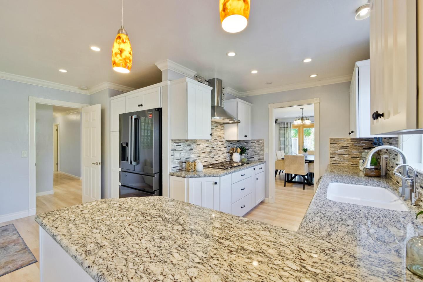 735 Widget Drive San Jose, CA 95117 - Photo 16 of 48 a kitchen with sink and refrigerator