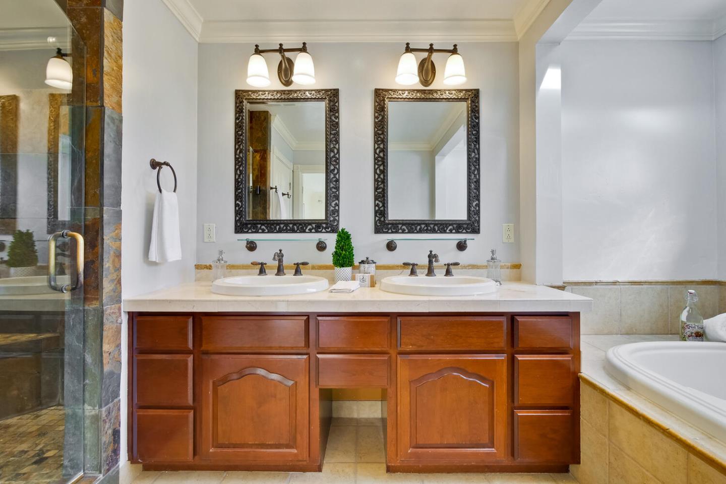 735 Widget Drive San Jose, CA 95117 - Photo 27 of 48 a bathroom with a sink and a mirror