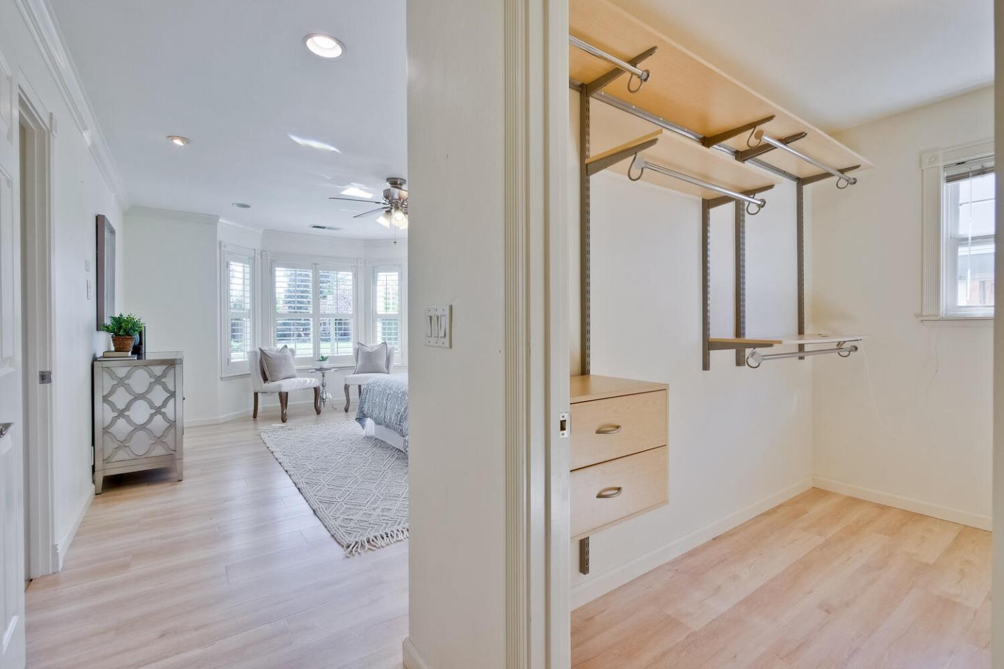 735 Widget Drive San Jose, CA 95117 - Photo 30 of 48 a view of a bedroom with furniture and wooden floor