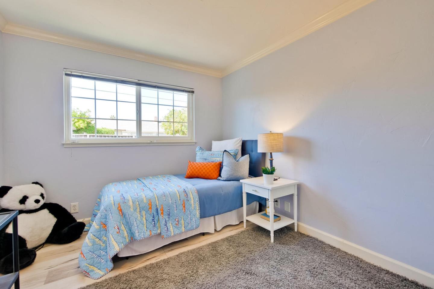 735 Widget Drive San Jose, CA 95117 - Photo 33 of 48 a bedroom with a bed and window