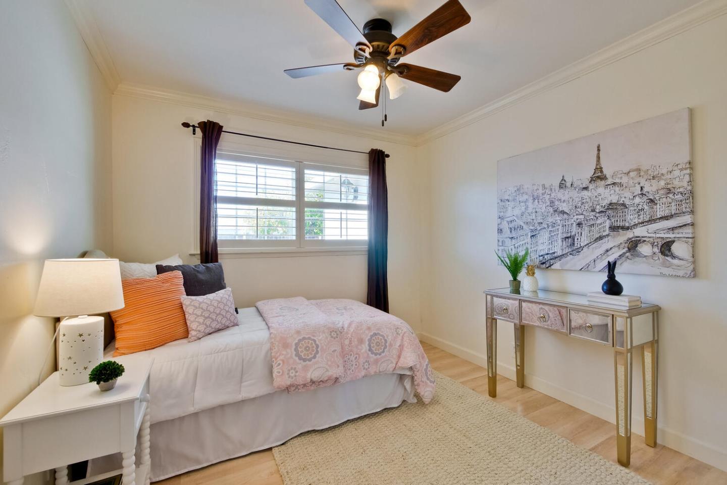 735 Widget Drive San Jose, CA 95117 - Photo 35 of 48 a bedroom with a bed and a chandelier