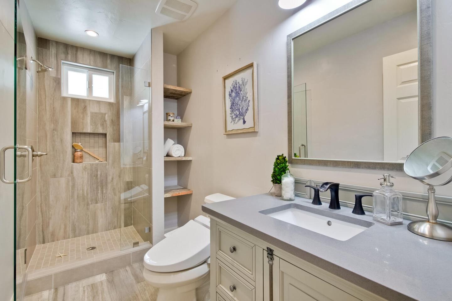 735 Widget Drive San Jose, CA 95117 - Photo 38 of 48 a bathroom with a sink a toilet and shower