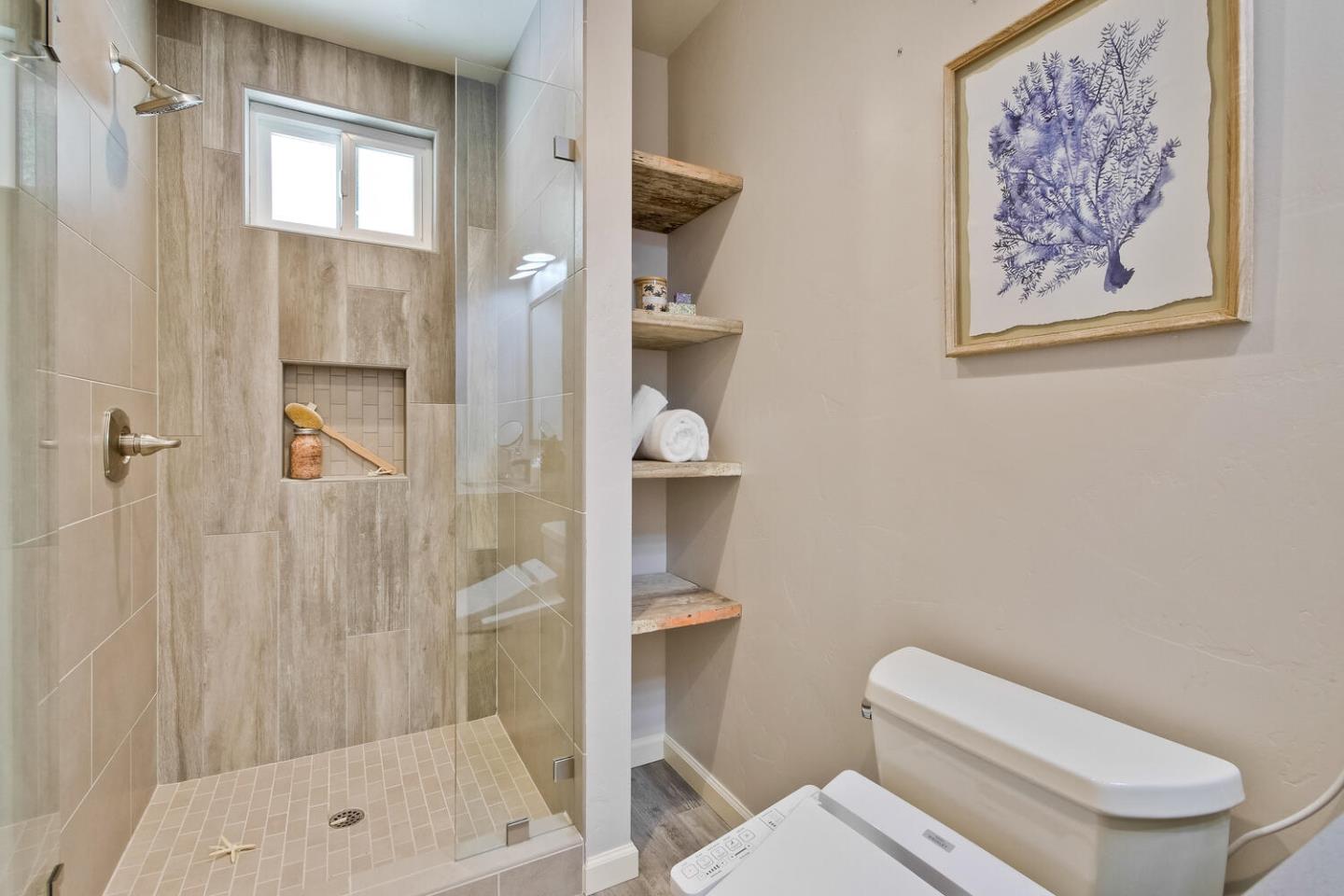 735 Widget Drive San Jose, CA 95117 - Photo 39 of 48 a white toilet sitting next to a bathroom shower