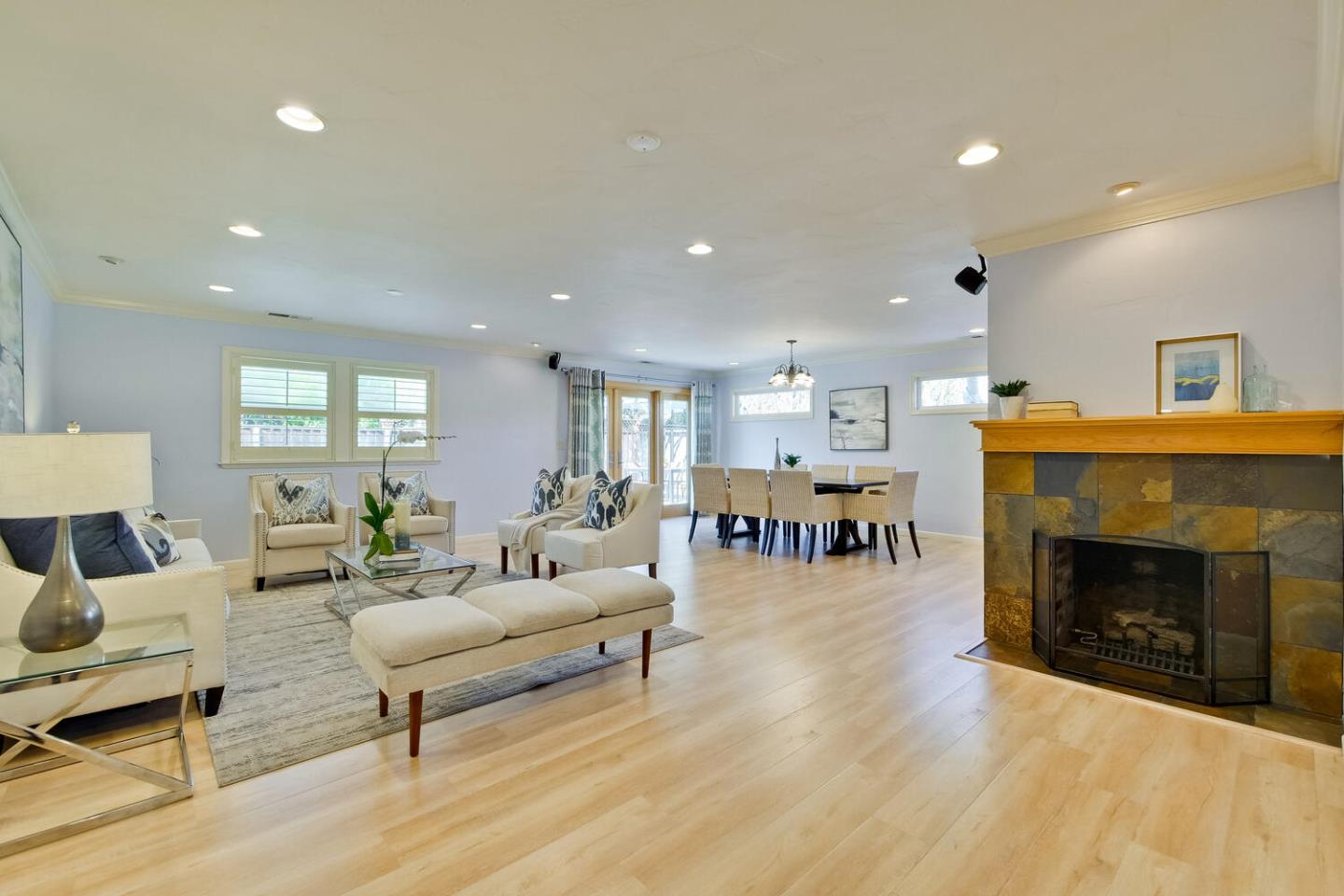 735 Widget Drive San Jose, CA 95117 - Photo 4 of 48 a living room with furniture and a fireplace
