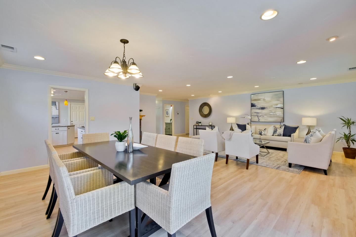 735 Widget Drive San Jose, CA 95117 - Photo 10 of 48 a view of a dining room with furniture and wooden floor