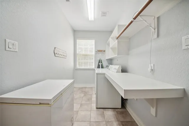 a kitchen with a cabinets and window