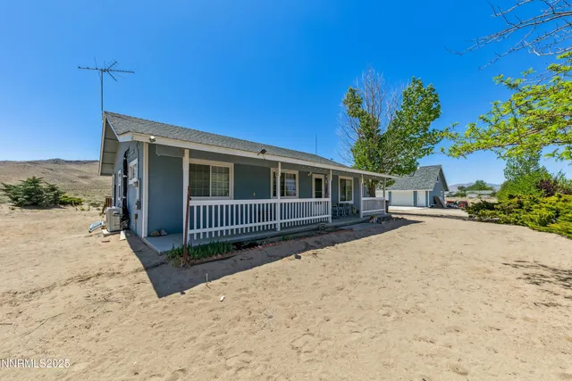 a view of a house with a patio