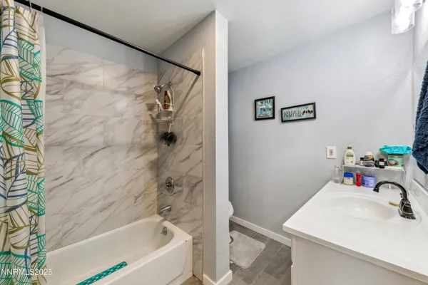 a bathroom with a sink and a bathtub