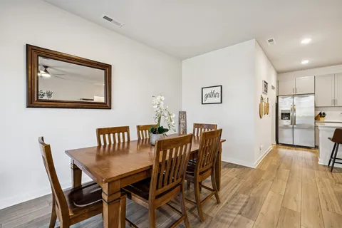 a large kitchen with a stove and a sink