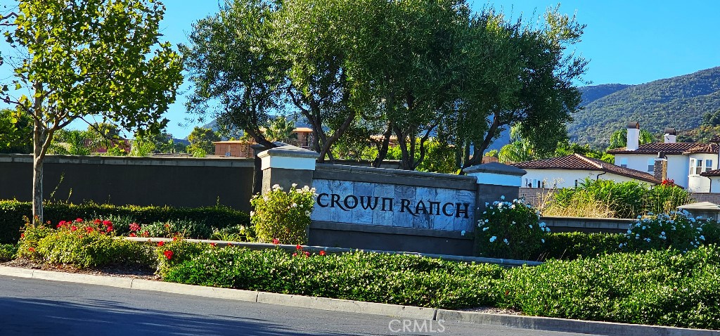 4182 Jameson Drive Corona, CA 92881 - Photo 11 of 19 a view of sign board with flower plants