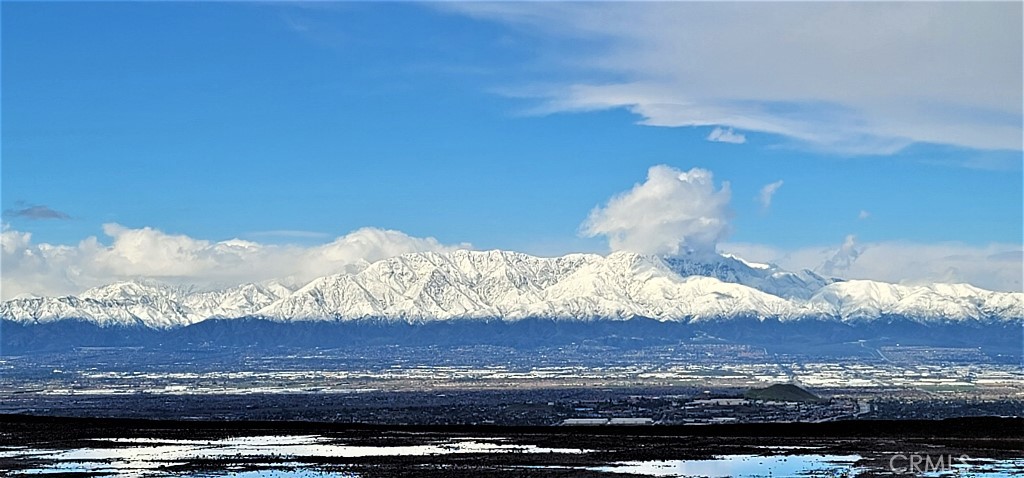 4182 Jameson Drive Corona, CA 92881 - Photo 19 of 19 a view of a fireplace with sunset view