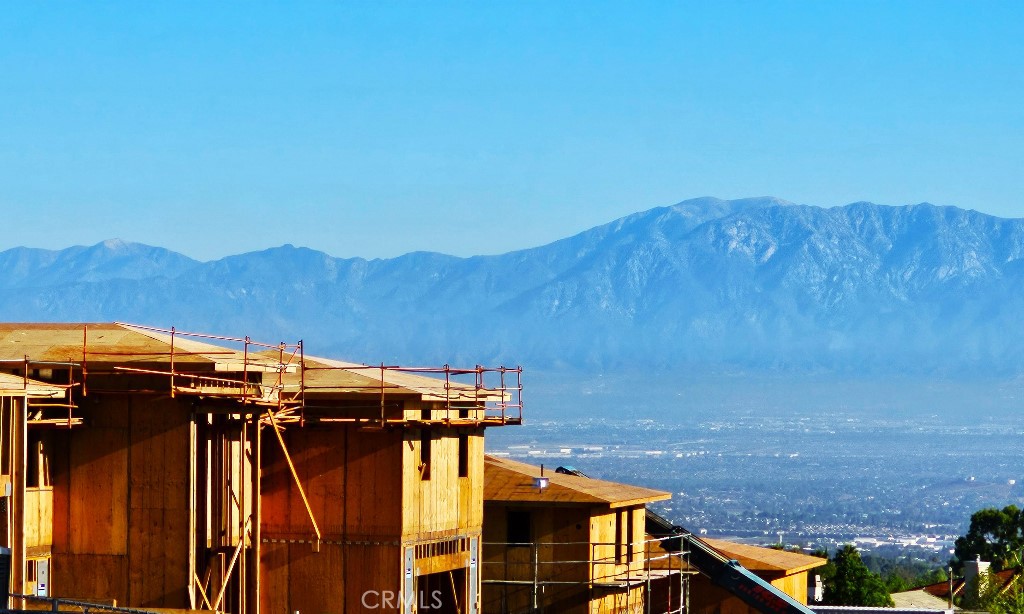 4182 Jameson Drive Corona, CA 92881 - Photo 10 of 19 a view of a house with mountain view