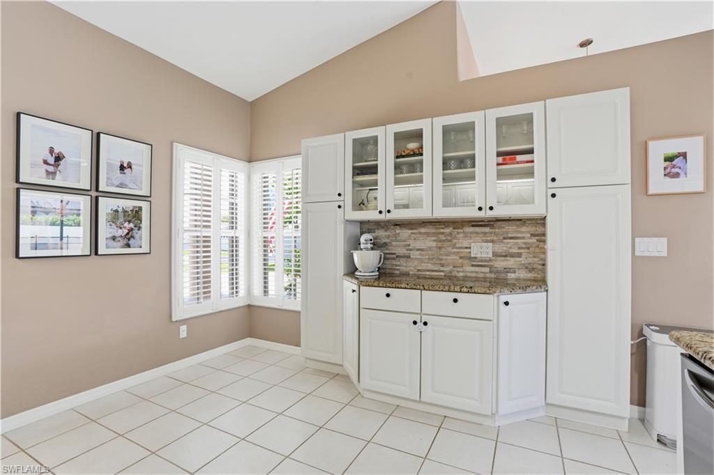 4356 Mistlethrush Lane Naples, FL 34119 - Photo 12 of 38 a view of an empty room with window