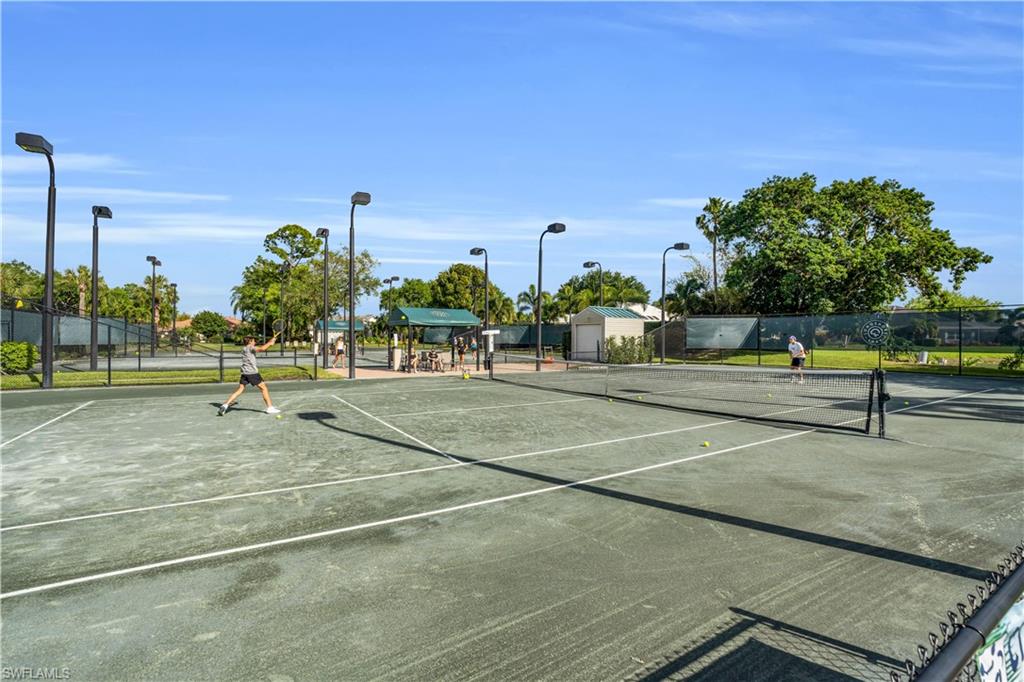 4356 Mistlethrush Lane Naples, FL 34119 - Photo 38 of 38 a view of a tennis court