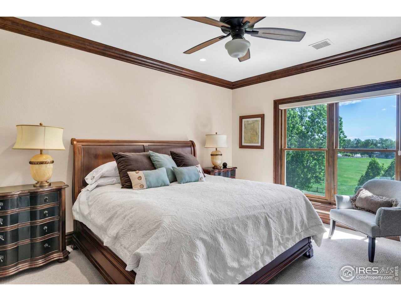 20360 County Road 3 Berthoud, CO 80513 - Photo 17 of 40 a bedroom with a large bed and a view of bedroom