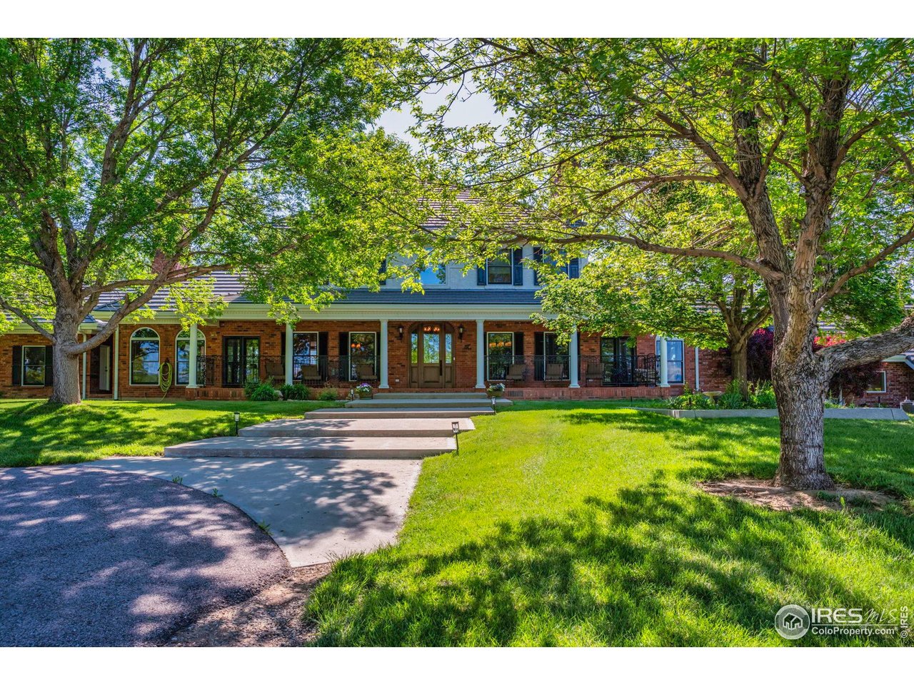 20360 County Road 3 Berthoud, CO 80513 - Photo 2 of 40 a view of a house with a yard