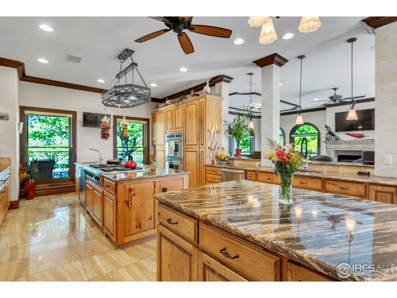 20360 County Road 3 Berthoud, CO 80513 - Photo 8 of 40 a kitchen with stainless steel appliances granite countertop a sink window and cabinets