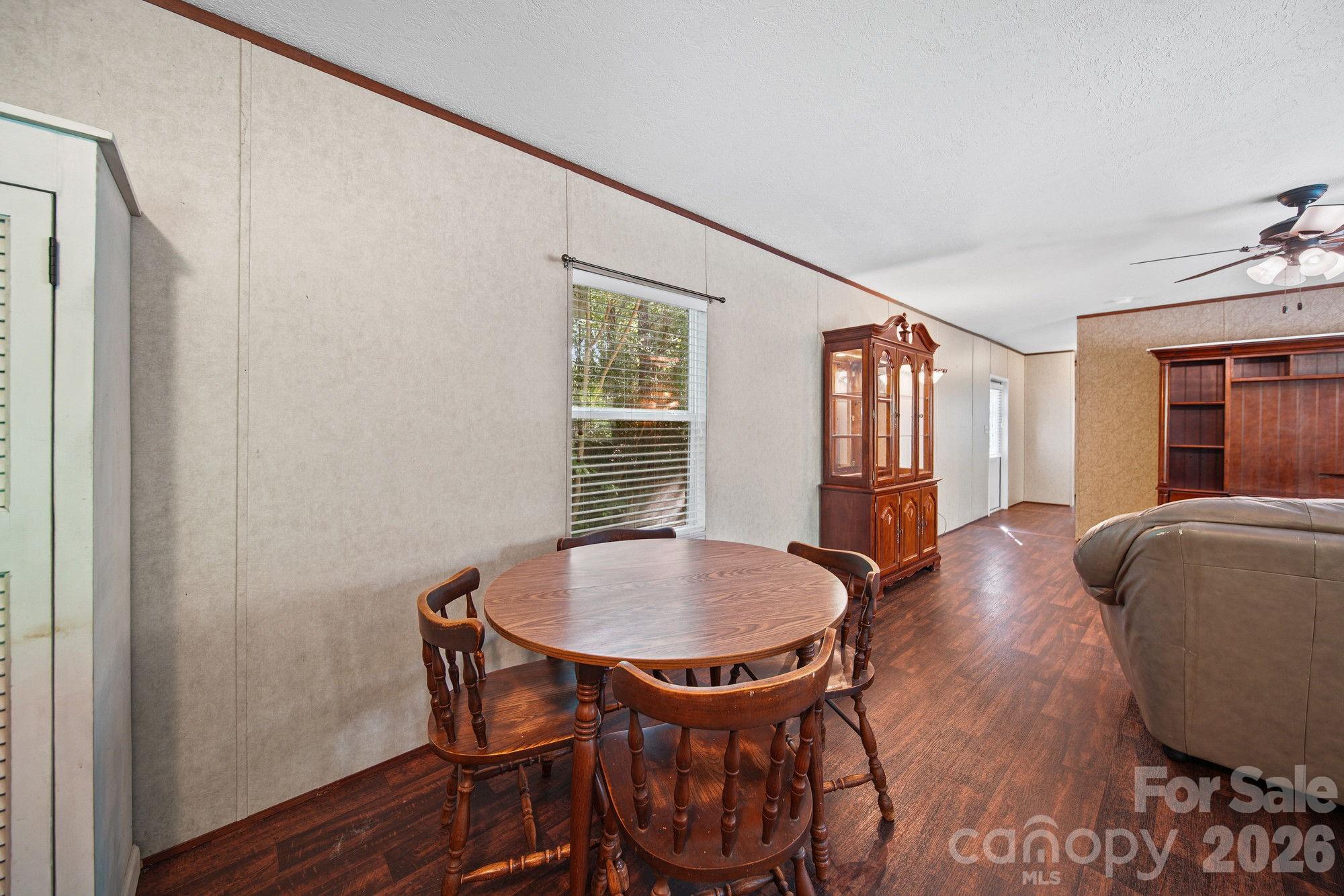 4507 White Store Road Wingate, NC 28174 - Photo 13 of 29 a living room with furniture and a window
