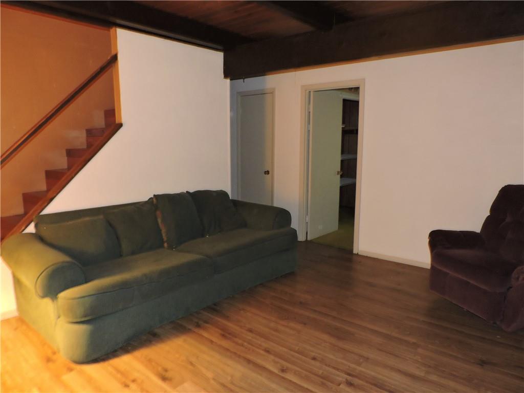 155 Maple Road Acme, PA 15610 - Photo 25 of 39 a living room with furniture and a wooden floor