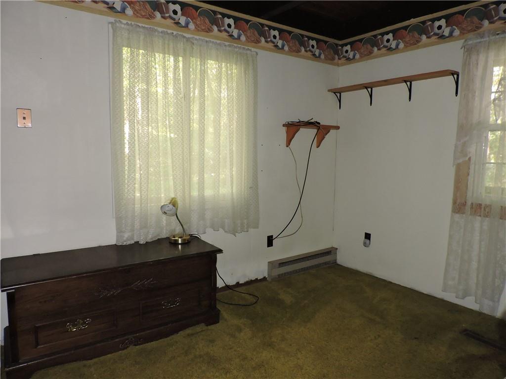155 Maple Road Acme, PA 15610 - Photo 26 of 39 a room with a window and a ceiling fan