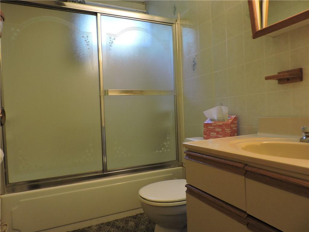 155 Maple Road Acme, PA 15610 - Photo 31 of 39 a bathroom with a sink toilet and shower