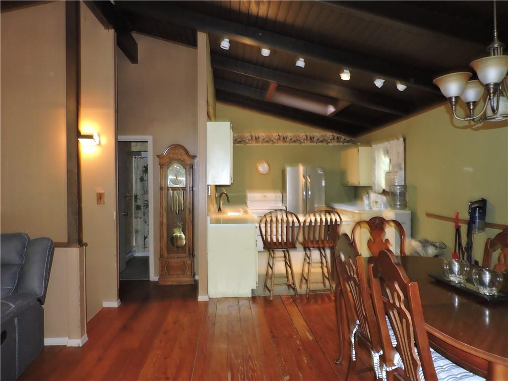 155 Maple Road Acme, PA 15610 - Photo 8 of 39 a view of a livingroom with furniture and wooden floor
