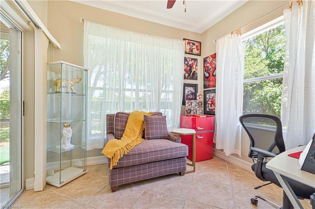 238 Stanhope Circle Naples, FL 34104 - Photo 20 of 33 a bedroom with furniture and a window